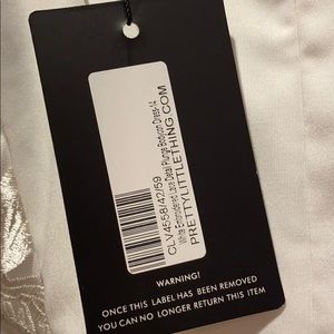 white embroidered lace detail plunge bodycon dress